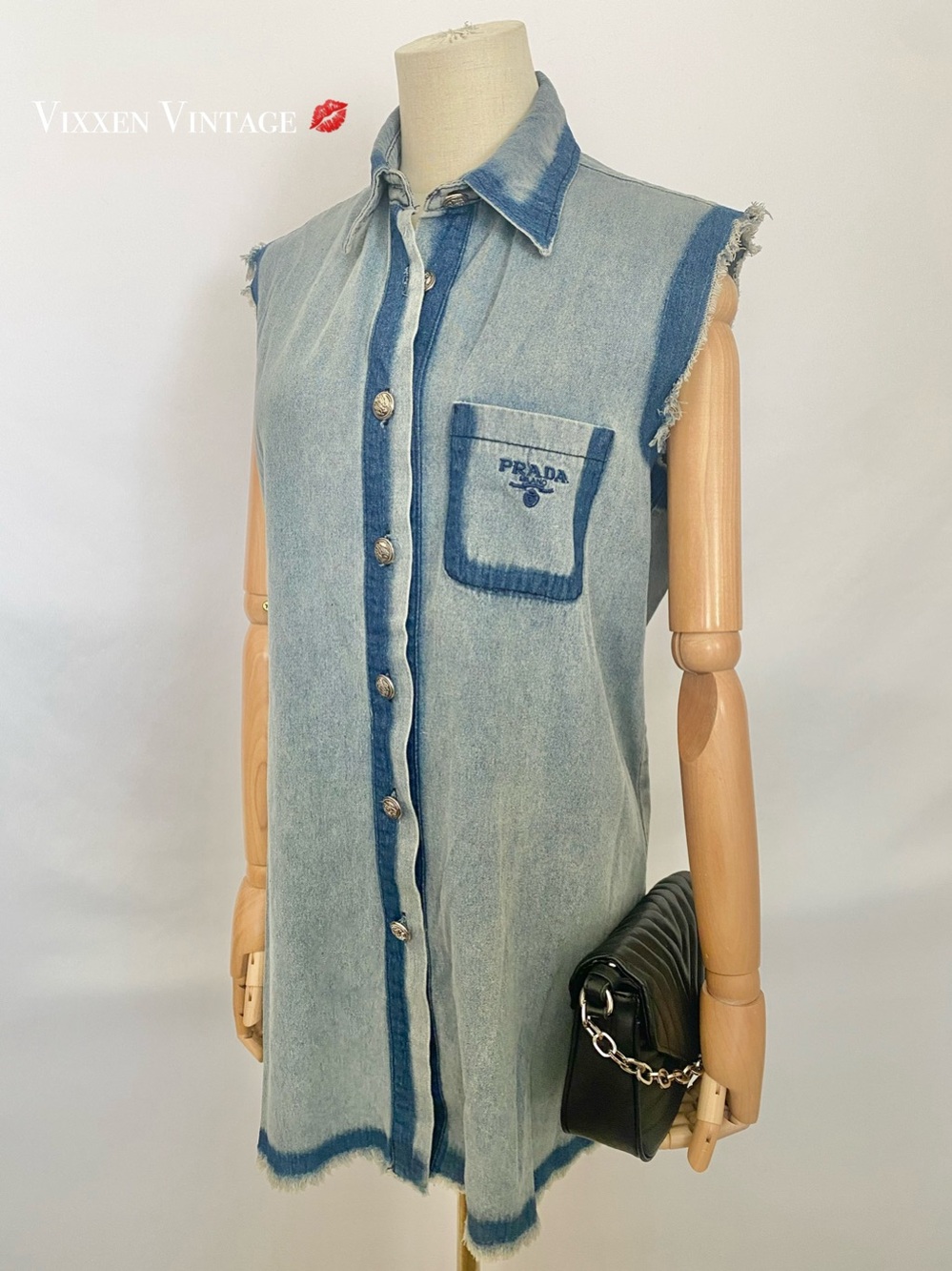 PRADA FRAYED SLEEVELESS BUTTON FRONT OVERSIZED DENIM SHIRTDRESS IN STONEWASH